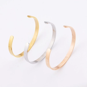 Three-piece set of 6mm polished stainless steel C-shaped open bangles in gold, rose gold, and silver