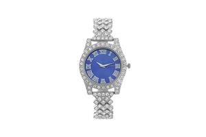 Close-up of silver fashion watch with blue dial and crystals on white background