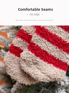 Detail of seamless toe stitching on cozy red and white striped coral fleece socks