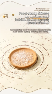 Macro view of food-grade silicone raw material granules on a non-stick baking mat