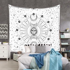 Macro detail of Bohemian mandala tapestry with celestial sun moon and zodiac symbols