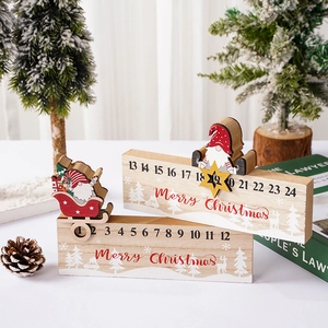Wooden Christmas countdown calendar ornaments with Santa gnomes and pine cone decorations