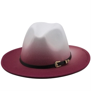 Detail of white to burgundy gradient felt fedora with vintage gold buckle leather band
