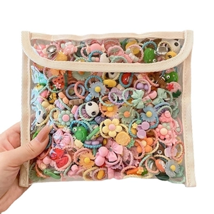 Colorful kids hair ties set with cute cartoon animals and flowers in a clear pouch
