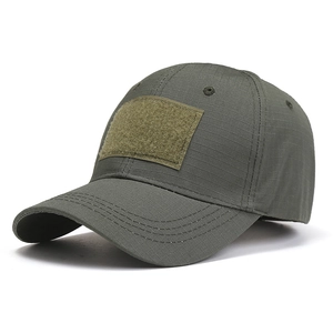 Close-up of olive drab ripstop tactical baseball cap featuring a large velcro front patch