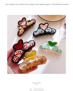 Detailed size specifications of heart-shaped acetate hair claw clips with various textures