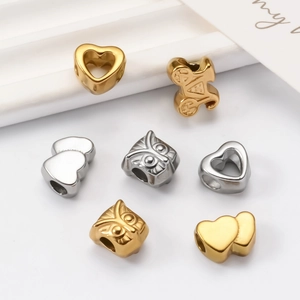 DIY stainless steel charm beads in heart and owl shapes, gold and silver finish