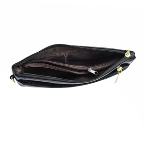 Elegant black leather crossbody square bag with multiple zip compartments and ample storage