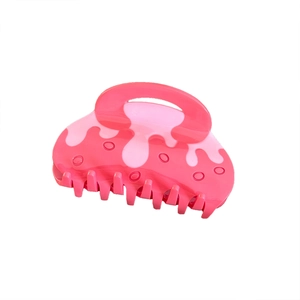 Pink acetate medium hair claw clip with sweet strawberry patterns on white background