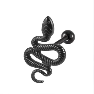 Detailed macro view of black surgical steel snake tongue ring with spherical bar ends
