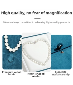 Detail view of heart-shaped blue velvet jewelry box interior with premium metal clasp