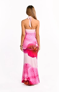 Detail view of pink orchid floral print on the back of a backless halter maxi dress
