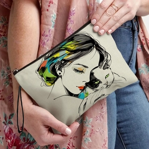 Chic canvas makeup bag with cat and female art print featuring a handy wrist strap