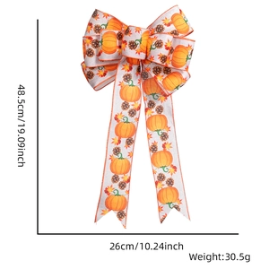 Detail of harvest bow with pumpkin and maple leaf prints showing 48.5cm by 26cm dimensions