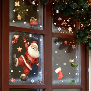 Christmas static window stickers set featuring Santa Claus, snowflakes, and festive patterns