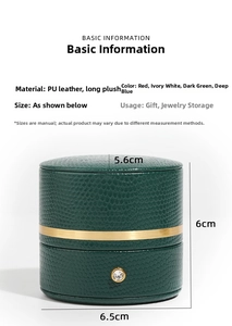 Macro detail of cylinder PU leather jewelry box with gold metal trim and rhinestone