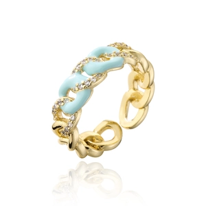 Detailed close-up of Cuban chain gold ring with light blue enamel and zircon stones