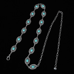 Detail of silver chain belt with turquoise oval stones and lobster clasp closure