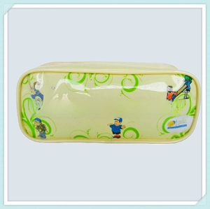 Detail of clear PVC pencil pouch with cartoon graphics and green vine patterns