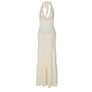 Detail showing the layered ruffle hem and back tie of a chic V-neck halter maxi dress