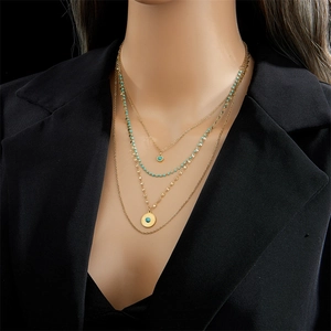 Three-layer gold titanium steel necklace with turquoise beads and round coin pendant