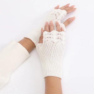 Detail of white knit fingerless gloves showing intricate openwork fish scale pattern