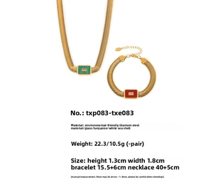 Detail view of gold titanium steel jewelry set featuring colorful glass and turquoise stones