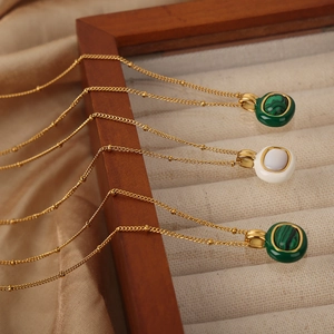 Gold-plated titanium steel necklaces with square malachite and shell pendants in a box