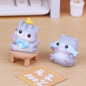 Miniature resin cat figurines with yellow chick and small blue fish for desk decor