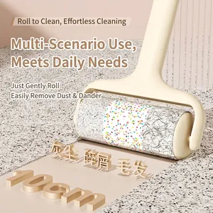 Handheld 10cm lint roller with cream handle for cleaning pet hair and dust on surfaces