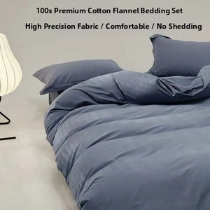 Detail of 100s cotton brushed fabric texture on blue-grey double-layer blanket bedding