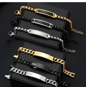 Showcase of curved bar bracelets in gold, silver, and black with sparkling zircons