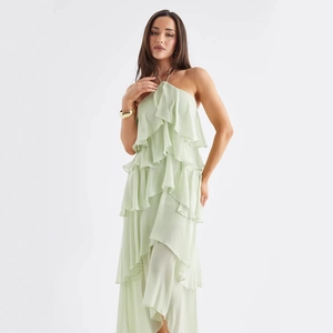 Elegant mint green halter tiered maxi dress with layered ruffles for summer vacation