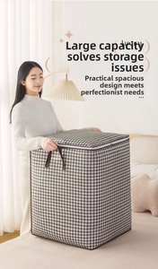Detail of large houndstooth storage bag with durable handles and double zipper