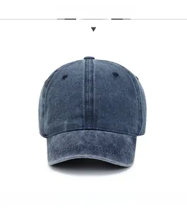 Front view of a dark blue washed denim baseball cap with a vintage soft top design