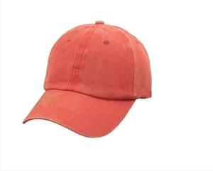 Detail view of washed cotton baseball cap showing vintage orange fabric and stitching