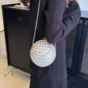 Elegant silver sequin sphere evening bag with gold ring handle and chain strap for women