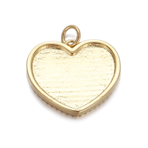 Detail of 14K gold plated heart charm with textured surface and hanging loop