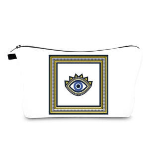 Detail of water-resistant toiletry bag with vibrant Evil Eye print and sturdy black zipper