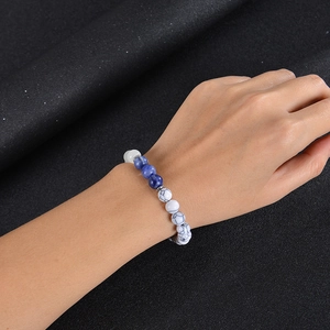 Unisex beaded bracelet featuring natural blue sodalite and white turquoise stones