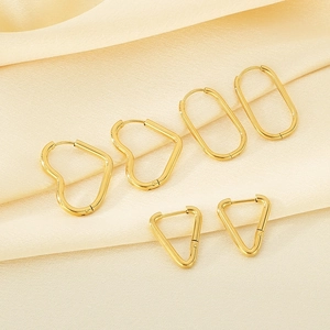 Three-pair set of gold stainless steel earrings in heart, oval, and triangle shapes