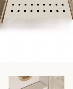 Detail of beige PVC doormat with black geometric patterns showing anti-slip silk loop texture