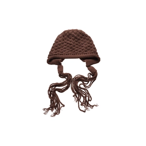 Handmade brown knit hat with bobble texture and long braided tassels on white background