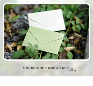 Macro shot of vintage fiber textured mini paper envelopes for gift cards in nature setup