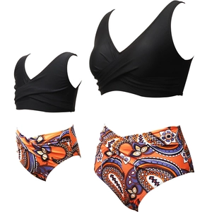 Matching parent-child bikini set with black V-neck tops and orange paisley high waist bottoms