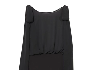 Detail of black chiffon bodysuit featuring shoulder bow ties and pleated texture design