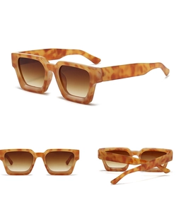 Macro details of square tortoise frame sunglasses with gradient brown resin lenses