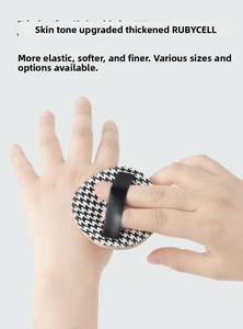 Detailed view of large houndstooth Rubycell makeup puff with thick soft texture