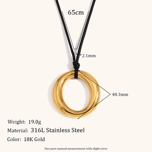 Polished 18K gold-plated stainless steel round pendant necklace on a minimalist black cord