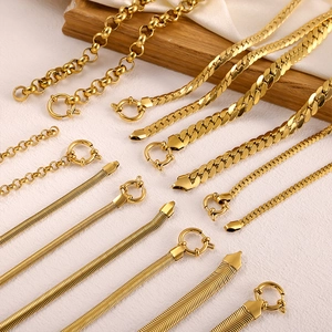 Various styles of 14K gold plated stainless steel chains including snake and Cuban links